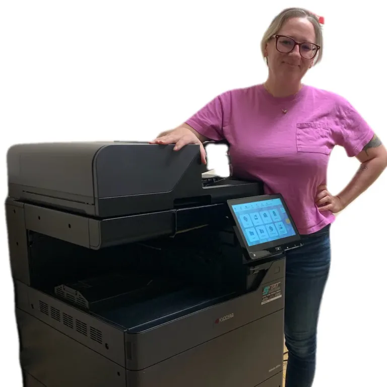 Radiology group staff member posing with the new Kyocera TASKalfa copier, demonstrating satisfaction with their latest lease from STAT Business Systems in Palm Beach, Florida.