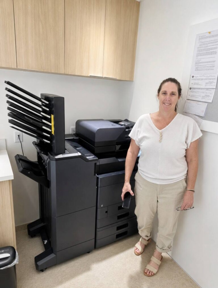 Kyocera MZ series color copier with multi-bin mailbox in a commercial builder office