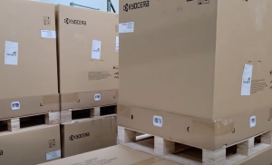 Kyocera Copier Pallets in Sunrise - STAT Business Systems - STAT Business Systems Kyocera copier shipment on pallets at the STAT Business Systems warehouse in Sunrise